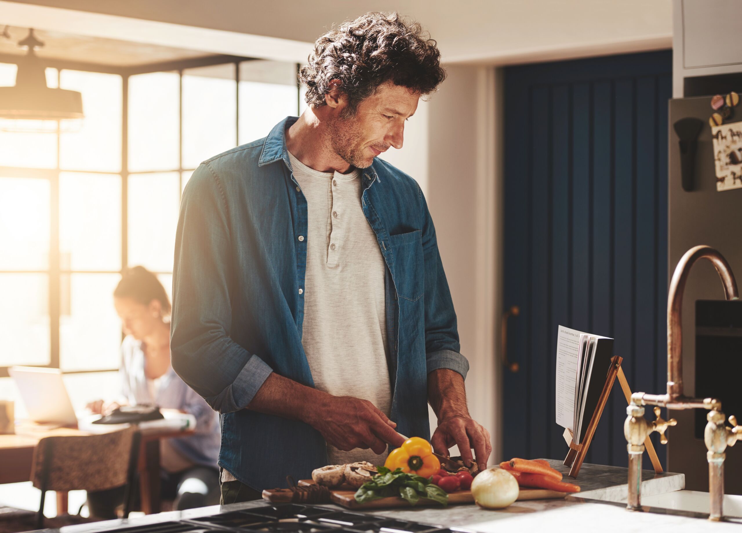 Cooking,,Food,And,Man,Cutting,Vegetables,In,The,Kitchen,For