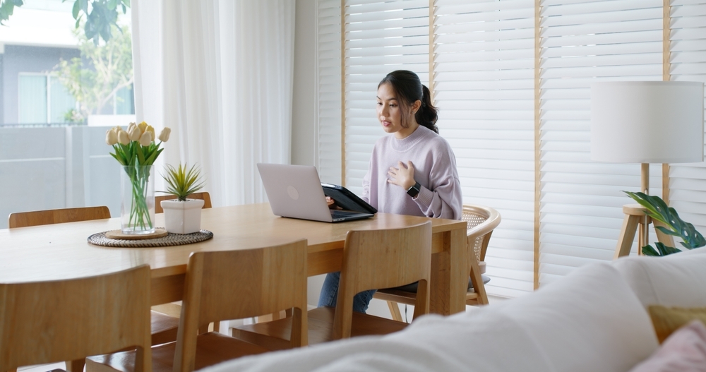 shutterstock_2505278525 woman using telehealth services for online gambling treatment at The Gambling Treatment